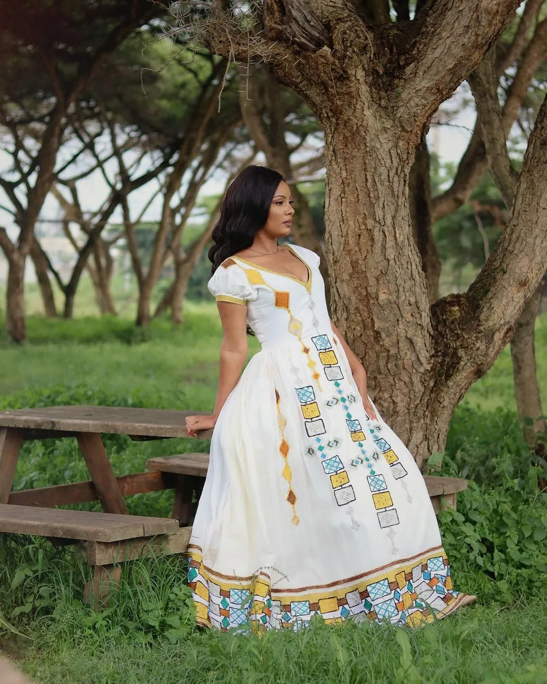 Dazzling Appearance with Ethiopian Traditional Dress: Multicolored Geometrical Patterns on Habesha Dress Beautiful Ethiopian Wedding Dress