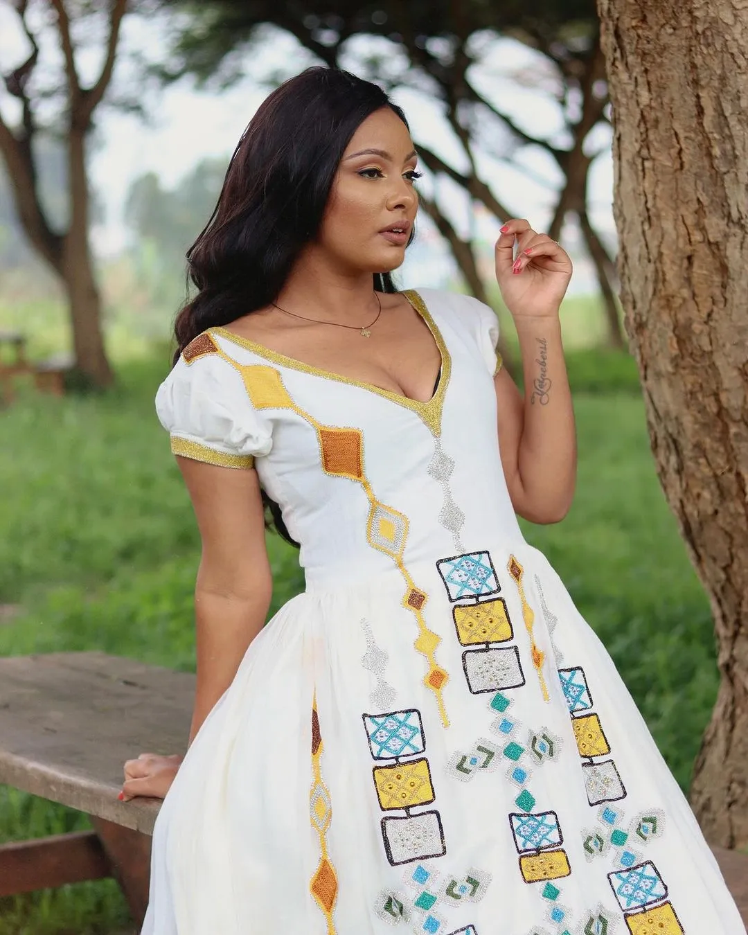 Dazzling Appearance with Ethiopian Traditional Dress: Multicolored Geometrical Patterns on Habesha Dress Beautiful Ethiopian Wedding Dress