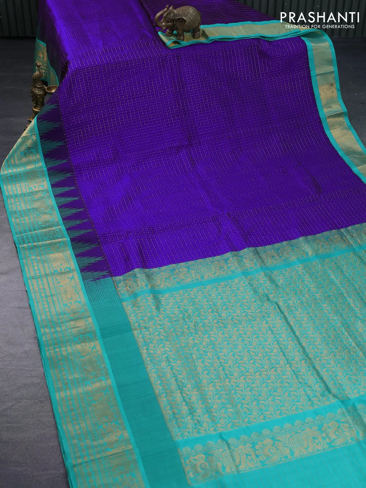 Kuppadam silk cotton saree blue and teal green with allover zari checks & buttas and temple woven elephant design zari border