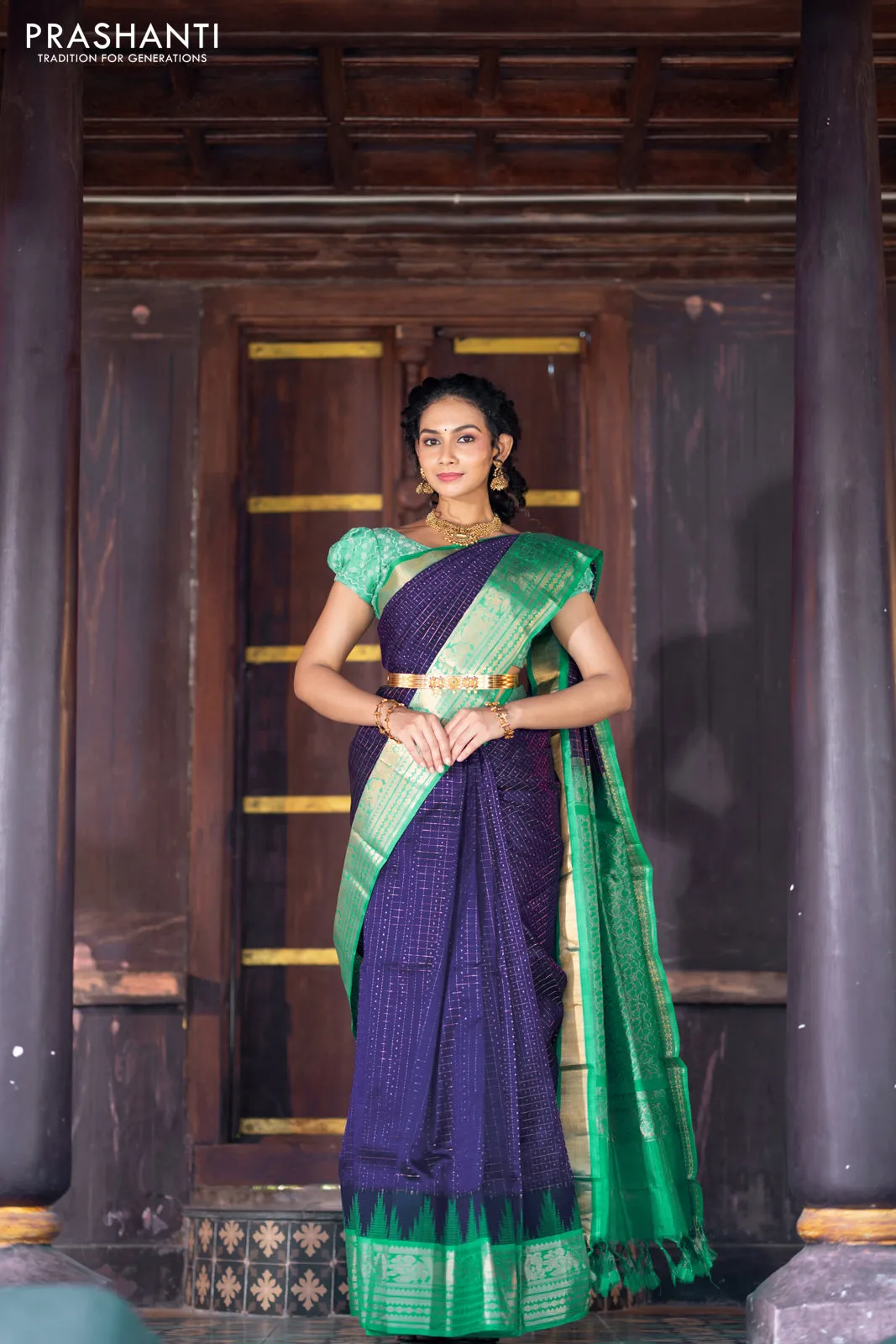 Kuppadam silk cotton saree blue and teal green with allover zari checks & buttas and temple woven elephant design zari border