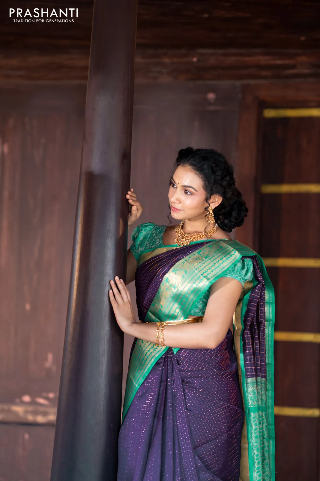 Kuppadam silk cotton saree blue and teal green with allover zari checks & buttas and temple woven elephant design zari border