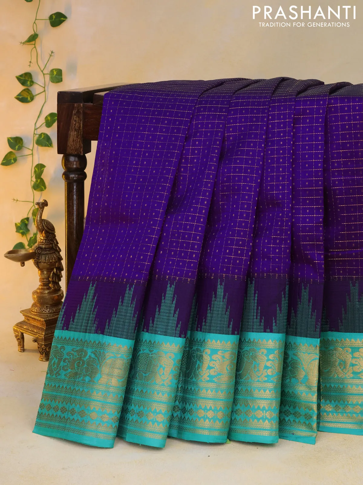 Kuppadam silk cotton saree blue and teal green with allover zari checks & buttas and temple woven elephant design zari border