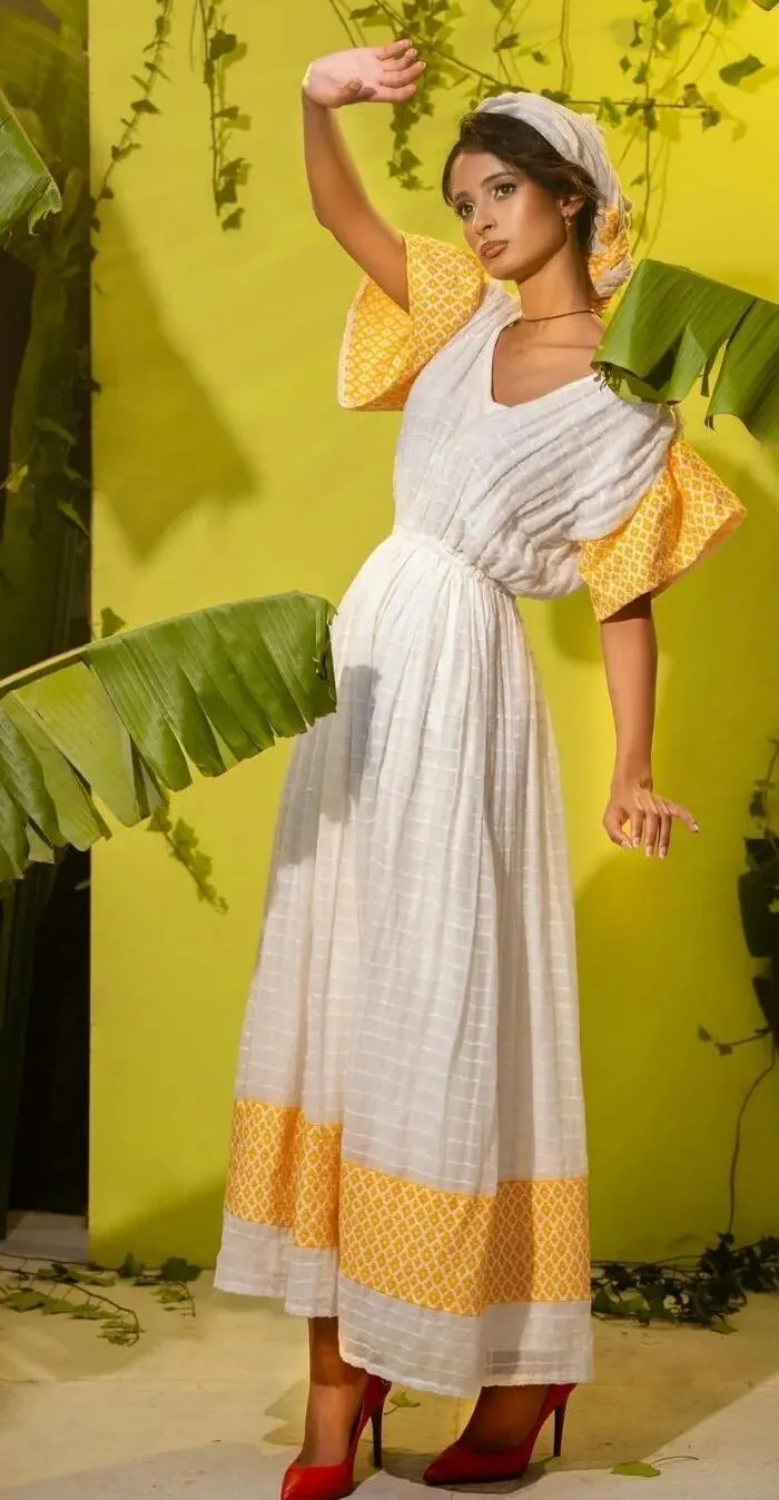 Ravishing Yellow Ethiopian Traditional Dress: Simple Eritrean Clothing for Any Cultural Celebrations Habesha Dress