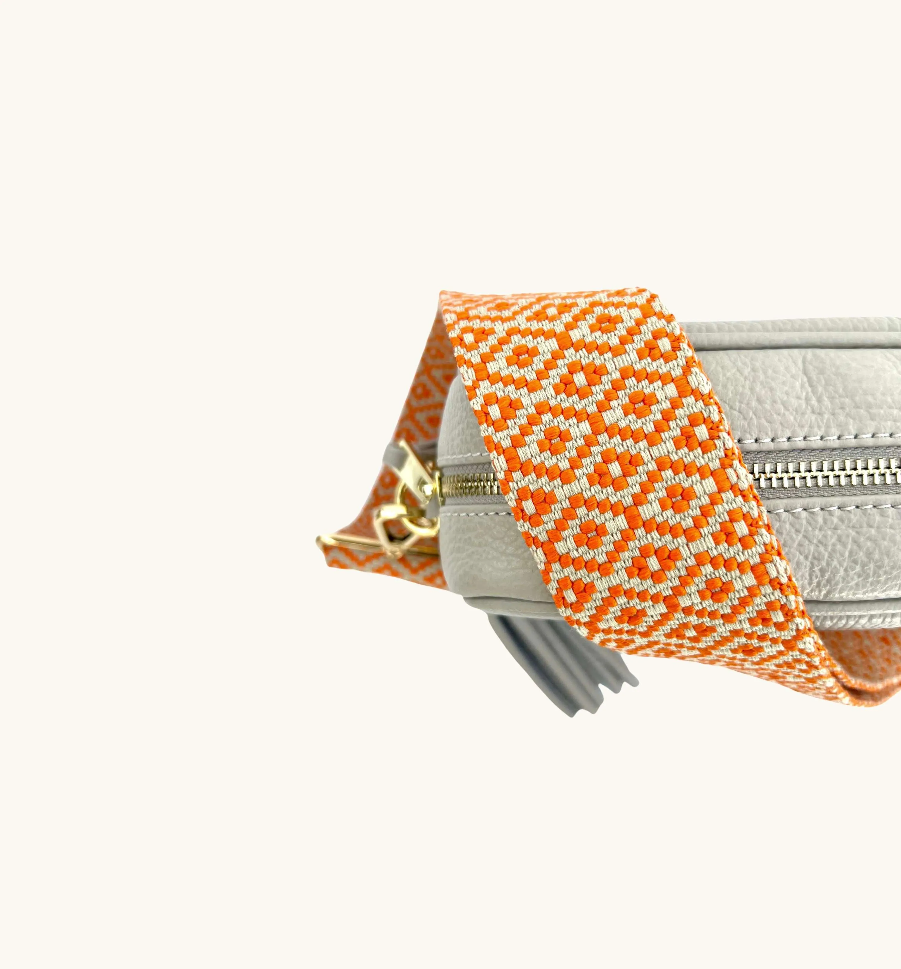 The Tassel Light Grey Leather Crossbody Bag With Orange Cross-Stitch Strap