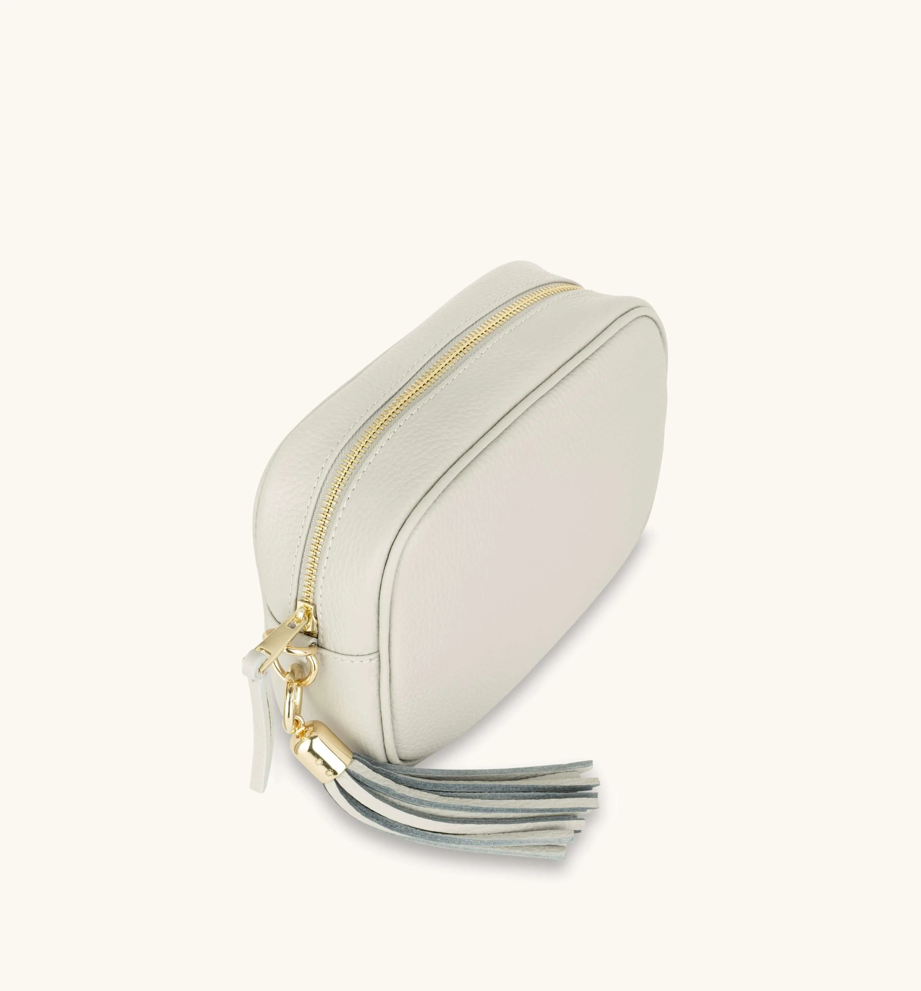 The Tassel Light Grey Leather Crossbody Bag With Orange Cross-Stitch Strap